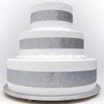 silver pop out four feet high four feet round cake